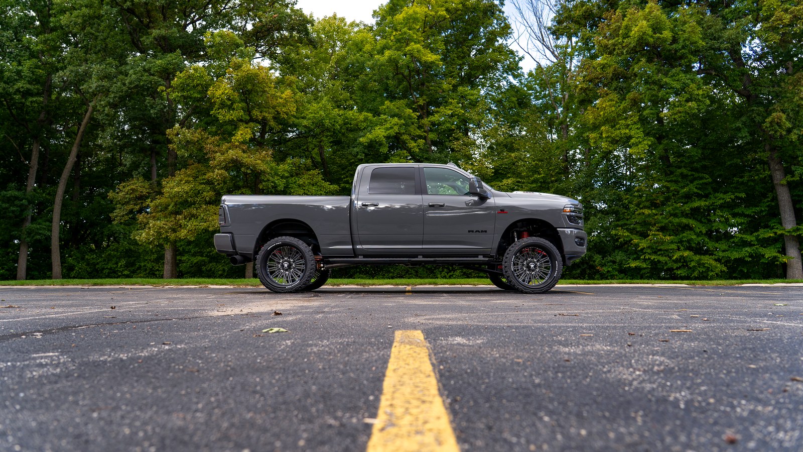 The finished 2026 Ram 3500 in profile on 26x14 American Force wheels